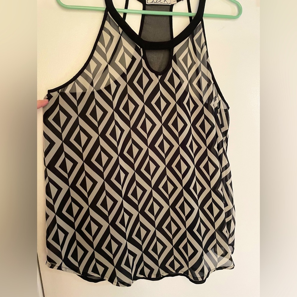 Cute black and beige print tank. Size L.